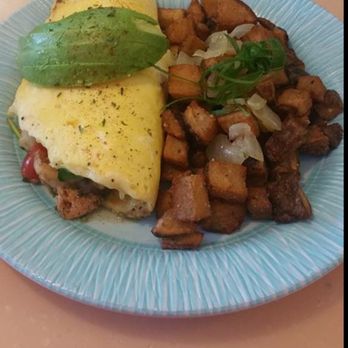 My Cafe - The hearty Kama'aina omelet with bacon, ham, portuguese suasage, spam, beansprouts, garlic, green onion, and cheese inside. - Breakfast & Brunch Near Me - Kapolei, Hawaii