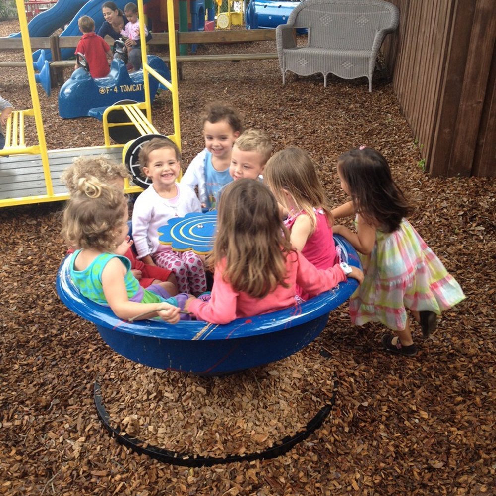 Morningside Montessori School - Happy toddlers playing on the playground! - Montessori Schools Near Me - Miami, Florida