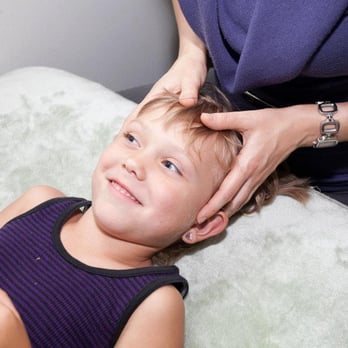 Center for Chiropractic + Wellness - Dr. Megan treating Ivy (5). - Chiropractors Near Me - Portland, Oregon