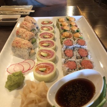Izumi Sushi - Nuruto (cucumber) in the middle, ocean on left, tiger back right and up front right spicy tuna. - Japanese Near Me - Great Falls, Virginia