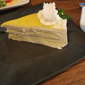 Rao Thai Eatery - Pandan layer cake. Very light and delicious. Pandan flavor with coconut sauce was good. - Thai Near Me - Elk Grove, California Rao Thai Eatery - Pandan layer cake. Very light and delicious. Pandan flavor with coconut sauce was good. - Thai Near Me - Elk Grove, California