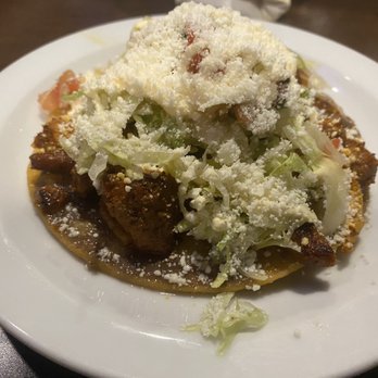 La Papa Loca - a plate of food on a table - Honduran Near Me - Lafayette, Louisiana