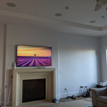 Man Cave America - 65" TV hung and wires hidden. - Home Theatre Installation Near Me Man Cave America - 65" TV hung and wires hidden. - Home Theatre Installation Near Me