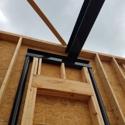 Conley Steel - 8x15 header beam to support main garage beam over window.