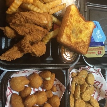 Zaxbys - 6pc chicken strips, CRINKLE fries, toast, slaw. Fried pickles on right and cheese curds on bottom left. Got 5-6 sauces not pictured. - Fast Food Near Me - Spring, Texas