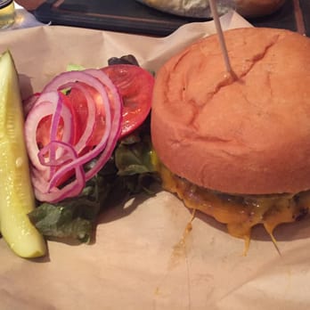 The Owners Box - My cheeseburger. They keep bottles of mayonnaise, ketchup and mustard on the table so you can dress it how you like. - Sports Bars Near Me - Dallas, Texas