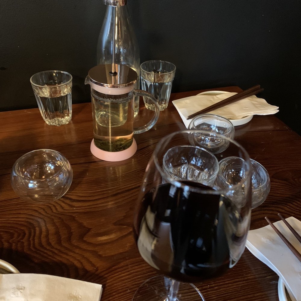 Jeju Restaurant - a glass of wine and a bottle of wine on a table - Korean Near Me - Tofino, British Columbia Jeju Restaurant - a glass of wine and a bottle of wine on a table - Korean Near Me - Tofino, British Columbia