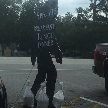 Hot Rod's Grill - a man holding a sign that says special breakfast lunch dinner - Breakfast & Brunch Near Me - White Lake, North Carolina Hot Rod's Grill - a man holding a sign that says special breakfast lunch dinner - Breakfast & Brunch Near Me - White Lake, North Carolina