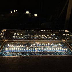 U-Haul Moving & Storage at Hammertown - My new fire pit table. I LOVE the beauty of the flame, glass wind guard, blue rocks, ambiance and the adjustable heat/flame! :0)