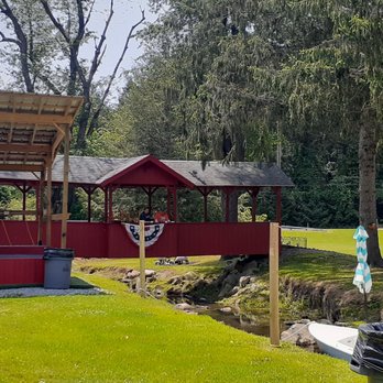 Hoffer's BBQ - a red covered gazebo with a boat in the foreground - Salad Near Me - Ligonier, Pennsylvania Hoffer's BBQ - a red covered gazebo with a boat in the foreground - Salad Near Me - Ligonier, Pennsylvania
