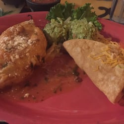 Chili relleno, beef taco, guac was $2.50 extra super small portion - lots of lettuce below