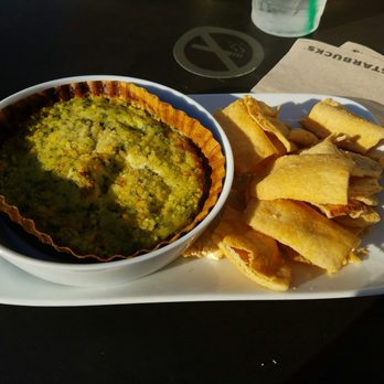 Starbucks - Spinach Artichoke dip and pita chips...part of the Starbucks evening menu - Coffee & Tea Near Me - Indianapolis, Indiana Starbucks - Spinach Artichoke dip and pita chips...part of the Starbucks evening menu - Coffee & Tea Near Me - Indianapolis, Indiana