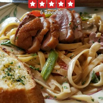 East Bay Grille - a plate of pasta and meat - Wine Bars Near Me - Prudenville, Michigan East Bay Grille - a plate of pasta and meat - Wine Bars Near Me - Prudenville, Michigan
