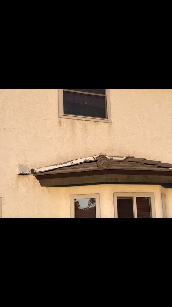 Slide of Ceus Roofing and Painting