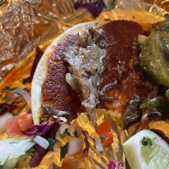 Hablo Tacos - Close up of the griddled cheese on the inside of the tortilla.  Adds great flavor, texture, and helps hold the tortillas together - Tacos Near Me - Bend, Oregon
