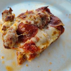 Tammy's Pizza - Thick chunks of mild sausage.