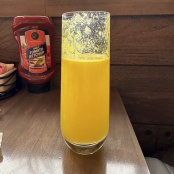 Egg House - Freshly squeezed OJ Mimosa  *already took a sip before the photo! - Breakfast & Brunch Near Me - Lombard, Illinois