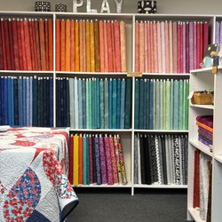 Cannizzaro Creations - This is just a portion of our fabric shelves.
