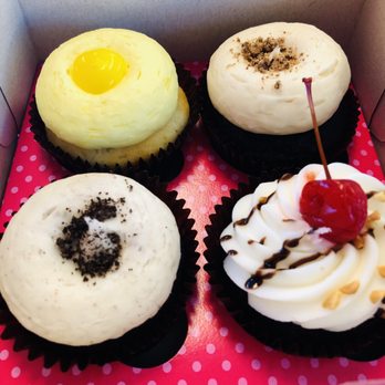 Smallcakes - From left to right: Lemon Drop / Peanut Butter Cup / Cookies and Cream / Hot Fudge Sundae - Cupcakes Near Me - Newport News, Virginia Smallcakes - From left to right: Lemon Drop / Peanut Butter Cup / Cookies and Cream / Hot Fudge Sundae - Cupcakes Near Me - Newport News, Virginia