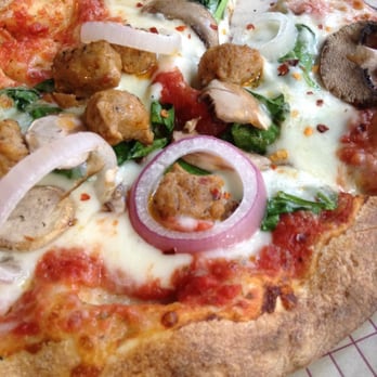 MOD Pizza - The Jasper (spicy Italian sausage, mushrooms, mozzarella) with red onion and spinach - Pizza Near Me - Seattle, Washington MOD Pizza - The Jasper (spicy Italian sausage, mushrooms, mozzarella) with red onion and spinach - Pizza Near Me - Seattle, Washington