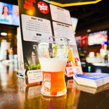 Famous Dave's Bar-B-Que - ows a glass of beer and a menu - Barbeque Near Me - San Jose, California Famous Dave's Bar-B-Que - ows a glass of beer and a menu - Barbeque Near Me - San Jose, California