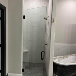 Champion Glass & Mirror - Inset shower with glass door and corner bench. call Champion 817-731-7403 #championglassfortworth #glasscut #glassnearme
