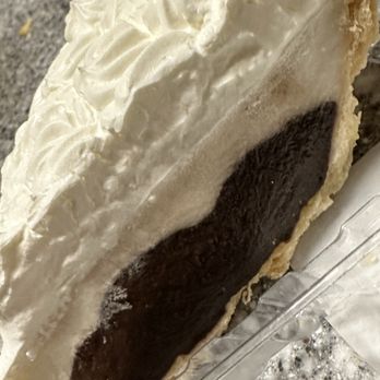 Ted's Bakery - The chocolate haupia pie when you open it. - Bakeries Near Me - Haleiwa, Hawaii
