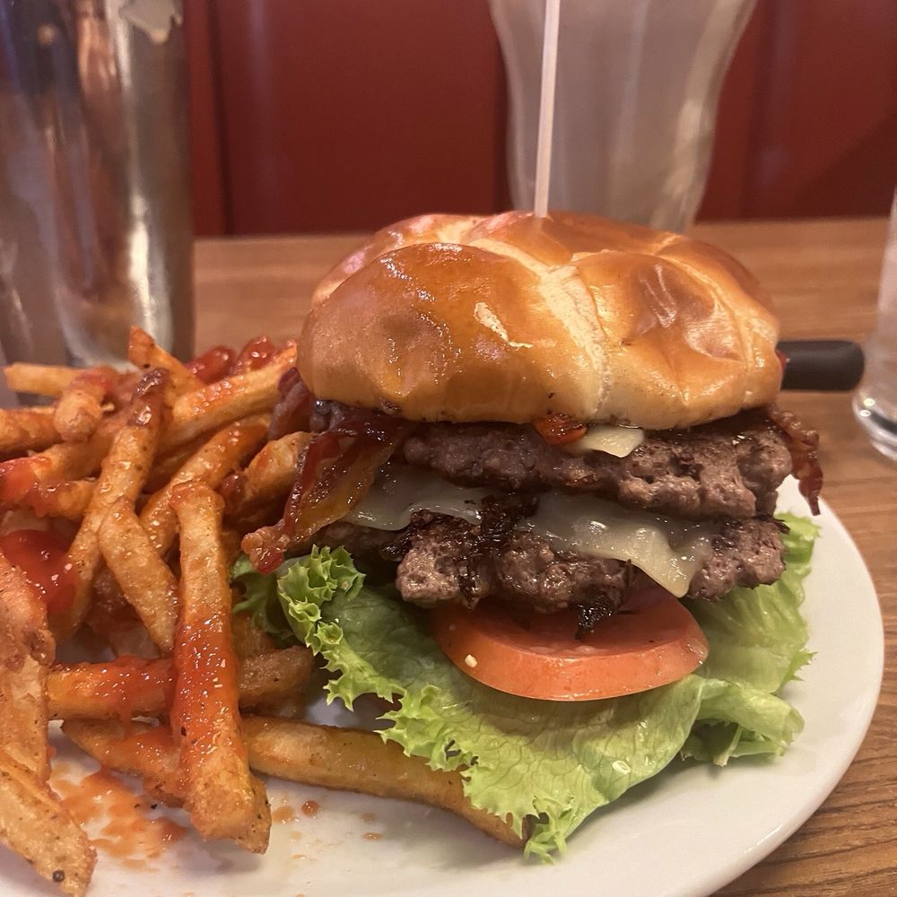 The double Bourbon Bacon Burger, seasoned fries and chocolate milkshake.  All damn good.