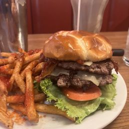 The double Bourbon Bacon Burger, seasoned fries and chocolate milkshake. All damn good. The double Bourbon Bacon Burger, seasoned fries and chocolate milkshake. All damn good.