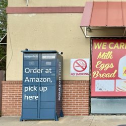 Shell - The Amazon app will open your locker once you are within about 10 feet of