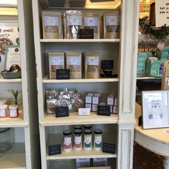 Ohh Macarons - a shelf full of macarons - Desserts Near Me - Bothell, Washington