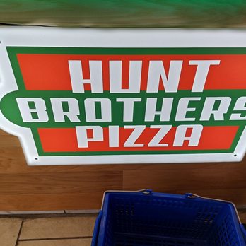 Mobil - a sign for hunt brothers pizza - Gas Stations Near Me - CHARLESTON, South Carolina