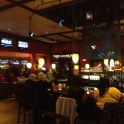 Greg Norman Australian Grille - Happy Hour...Drinks off price until 7