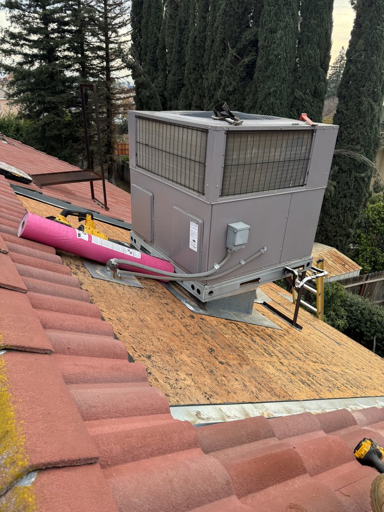 Slide of Top Valley Roofing