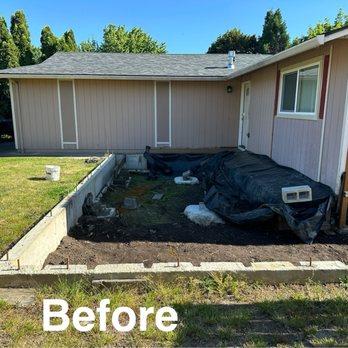 PDX Sewer Solutions - Front view of the house with the foundation still in place. - Excavation Services Near Me