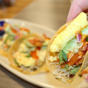 Snooze, an A.M. Eatery - Juan's Breakfast Tacos made with three fresh corn tortillas topped with scrambled cage-free eggs, hash browns, & jack cheese - Breakfast & Brunch Near Me - Denver, Colorado Snooze, an A.M. Eatery - Juan's Breakfast Tacos made with three fresh corn tortillas topped with scrambled cage-free eggs, hash browns, & jack cheese - Breakfast & Brunch Near Me - Denver, Colorado