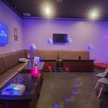 Let's Go Karaoke - a living room with couches and a tv - Karaoke Near Me - Doraville, Georgia Let's Go Karaoke - a living room with couches and a tv - Karaoke Near Me - Doraville, Georgia