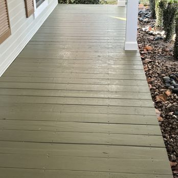 Huntley Home Services - Raised and leveled new porch along with the decorative accent at the base of the white poles - Handyman Near Me - Gonzales, Louisiana