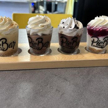Laurie’s Pie Bar - Pie flight-left to right- key-lime, Mexican hot chocolate, cookies and cream, white chocolate raspberry. - Bakeries Near Me - Long Beach, California