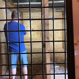 a man in a blue shirt and blue shorts a man in a blue shirt and blue shorts