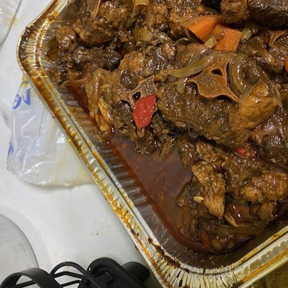 Big Daddy's Caribbean Taste - A catered pan of oxtails full of grease - Caribbean Near Me - Bronx, New York Big Daddy's Caribbean Taste - A catered pan of oxtails full of grease - Caribbean Near Me - Bronx, New York