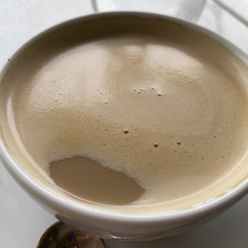 Melo Patisserie - Flat white fail. Missing the thick microfoam layer. More like cafe au lait. Still tastes good. - Coffee & Tea Near Me - Vancouver, British Columbia Melo Patisserie - Flat white fail. Missing the thick microfoam layer. More like cafe au lait. Still tastes good. - Coffee & Tea Near Me - Vancouver, British Columbia
