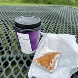 Cafe au lait and beignet Cafe au lait and beignet