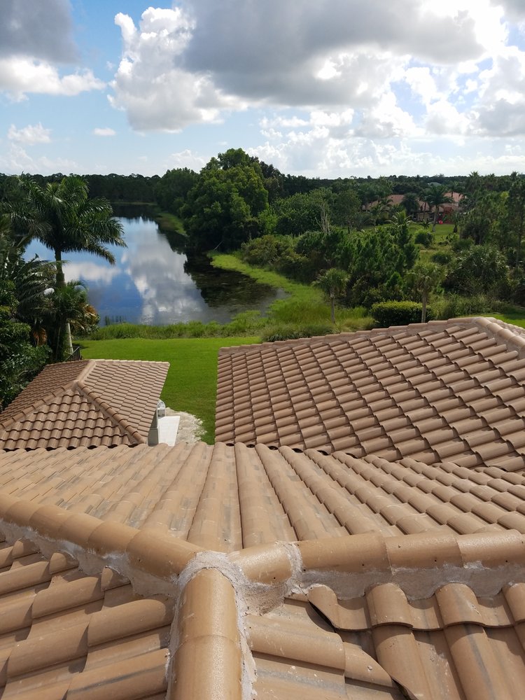 Slide of All American Roofing And Coating Of Florida