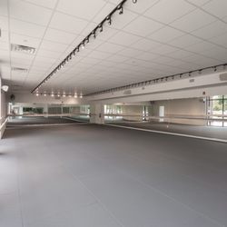 barre3 - Our studio fits 32 and offers a supportive foam floor