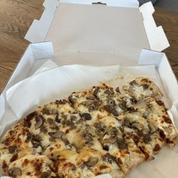 The Pour Vineyard - Ricotta mushroom sausage with a drizzle of honey pizza