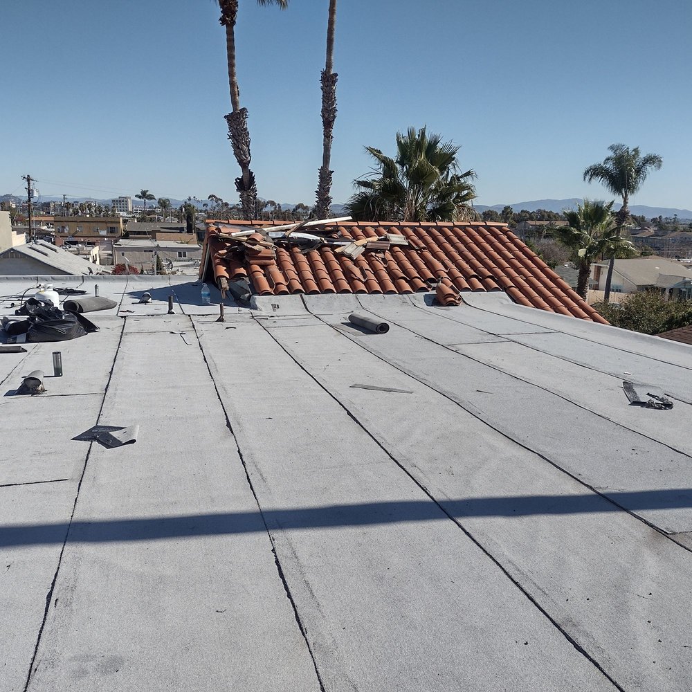 Slide of Mendez roofing