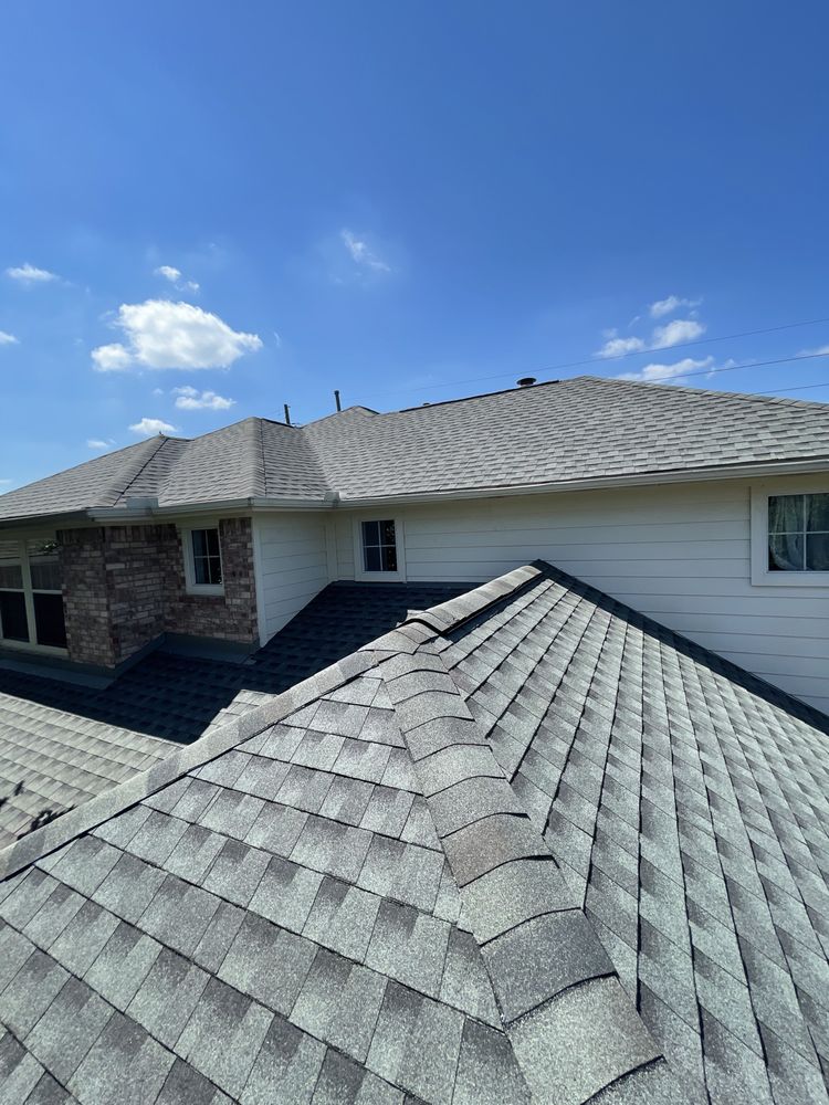 Slide of Rapid Roofing and Construction