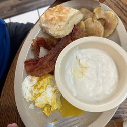 Lolly's Cafe - 2 eggs overnight done to perfection! Hash browns and fresh biscuit with gray