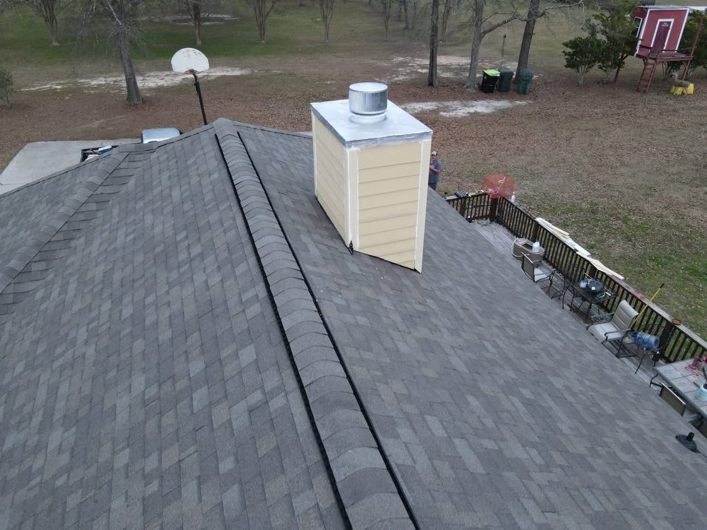 Slide of Rivertop Roofing